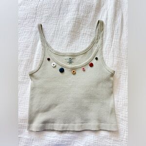 Brandy melville Light green tank, Buttons hand sewn into it. No holes or stains